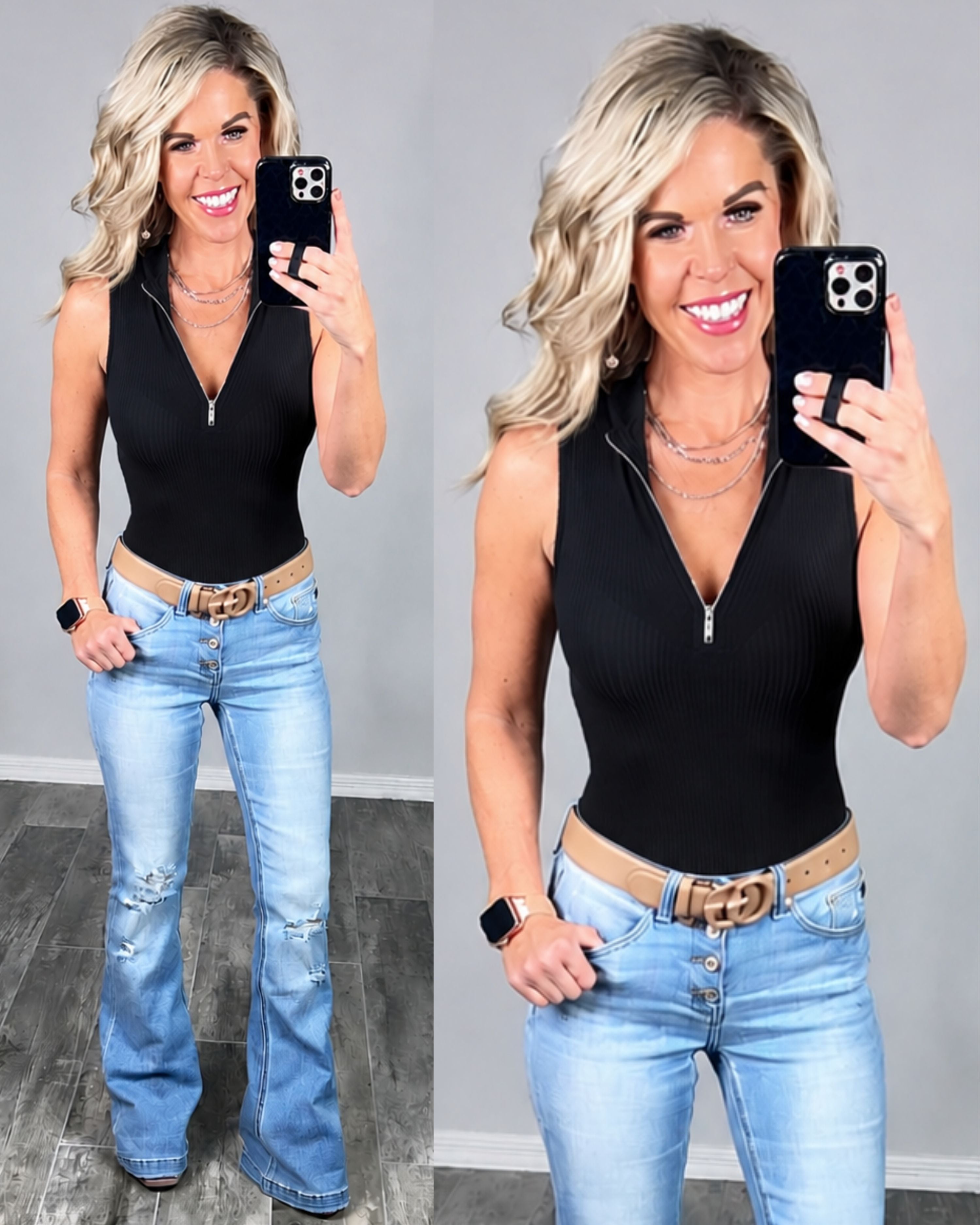 sleeveless black ribbed top with a front zipper, paired with light-wash blue jeans and a tan belt, against a plain gray wall.